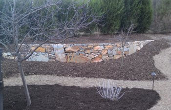 Stone retaining wall in the garden