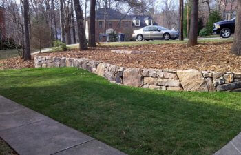 Stone retaining wall in the garden