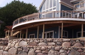 A retaining wall in front of the house