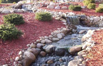 Stone waterfall in the garden